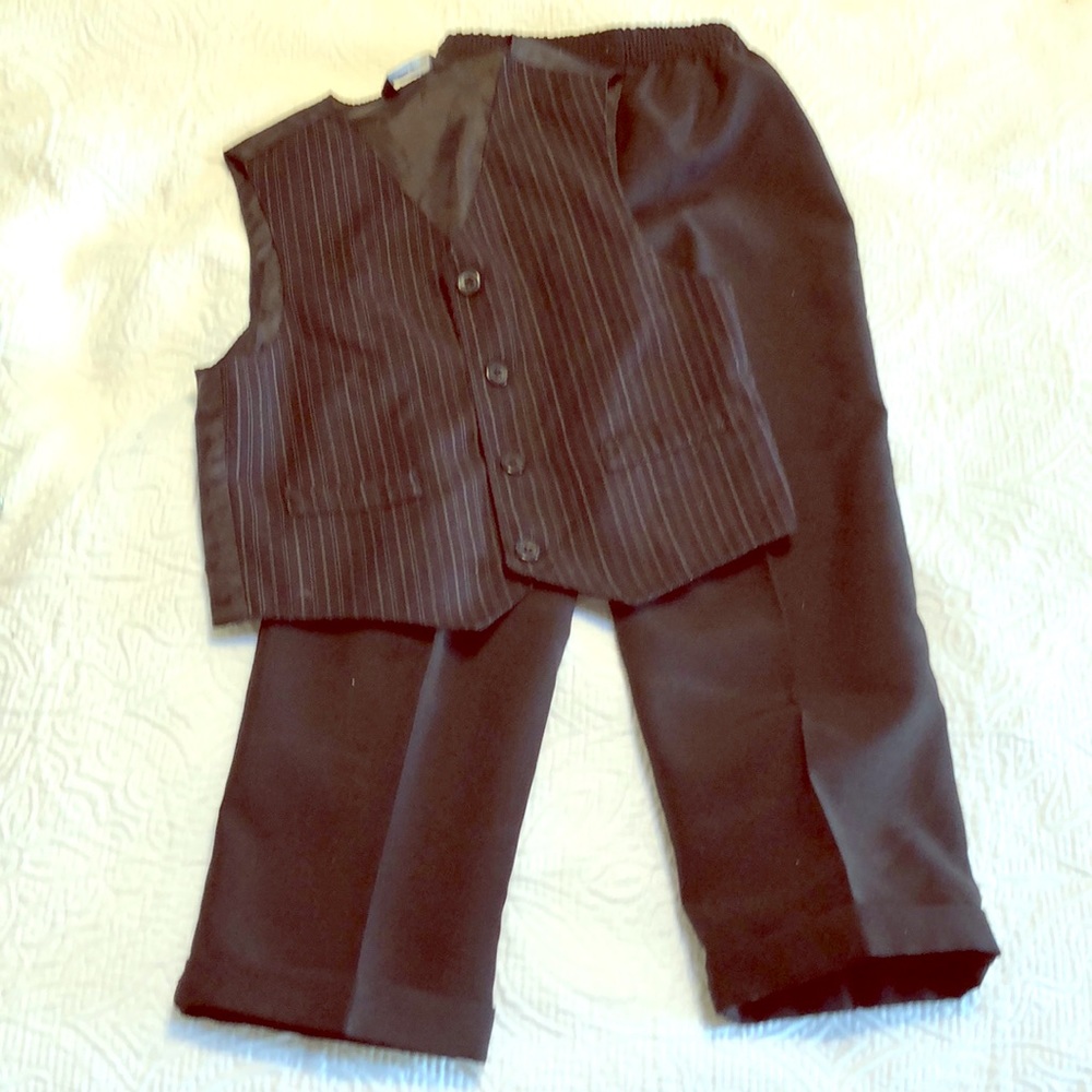 Black pants, pin-stripe vest